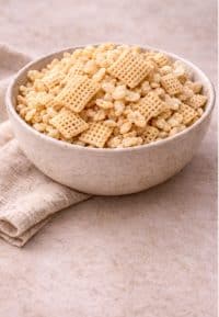 Bowl of crispy rice cereal blend, the light and crunchy foundation used in handcrafted weScotchoo Scotcheroo Bars.